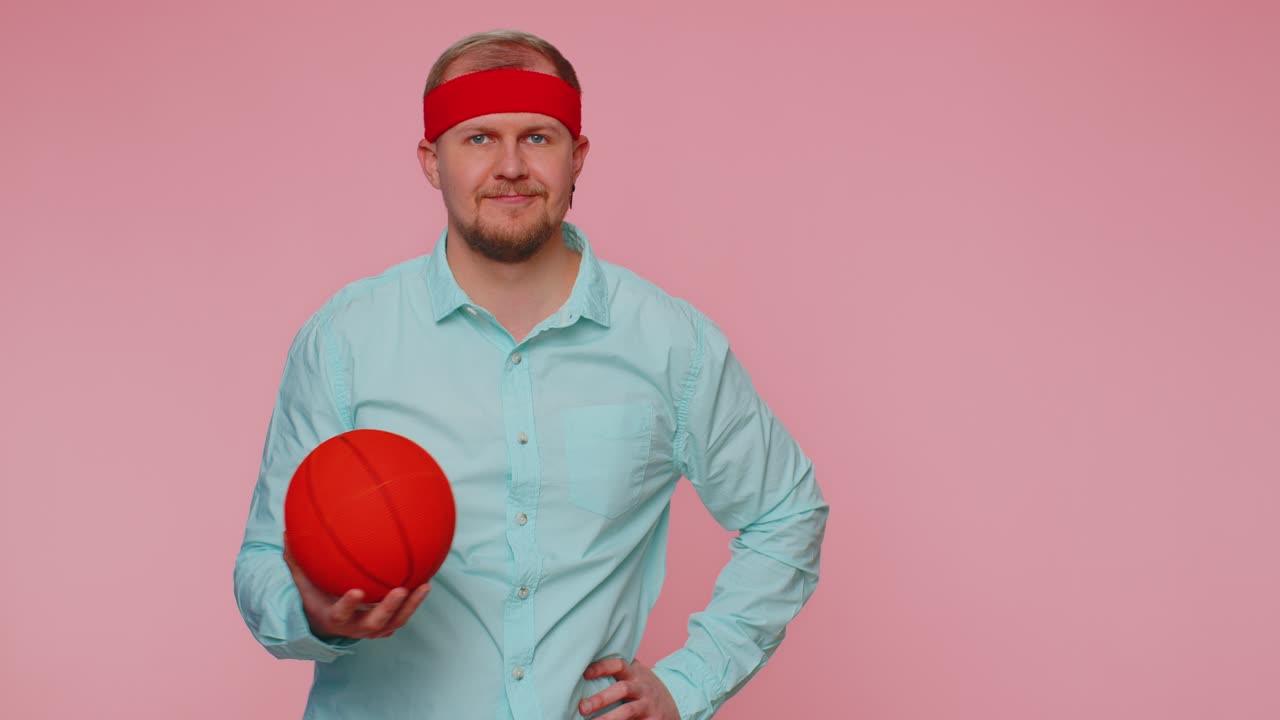 Man sportsman basketball fan holding ball training dribbling workout sport motivation lifestyle