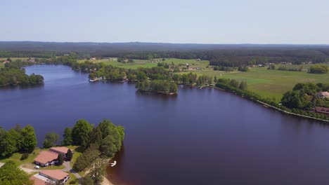 majestic aerial top view flight rural village chlum on lake in czech republic europe, summer day of 2023