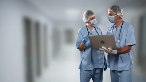 animación de médicos que usan el coronavirus covid-19 y usan una computadora portátil