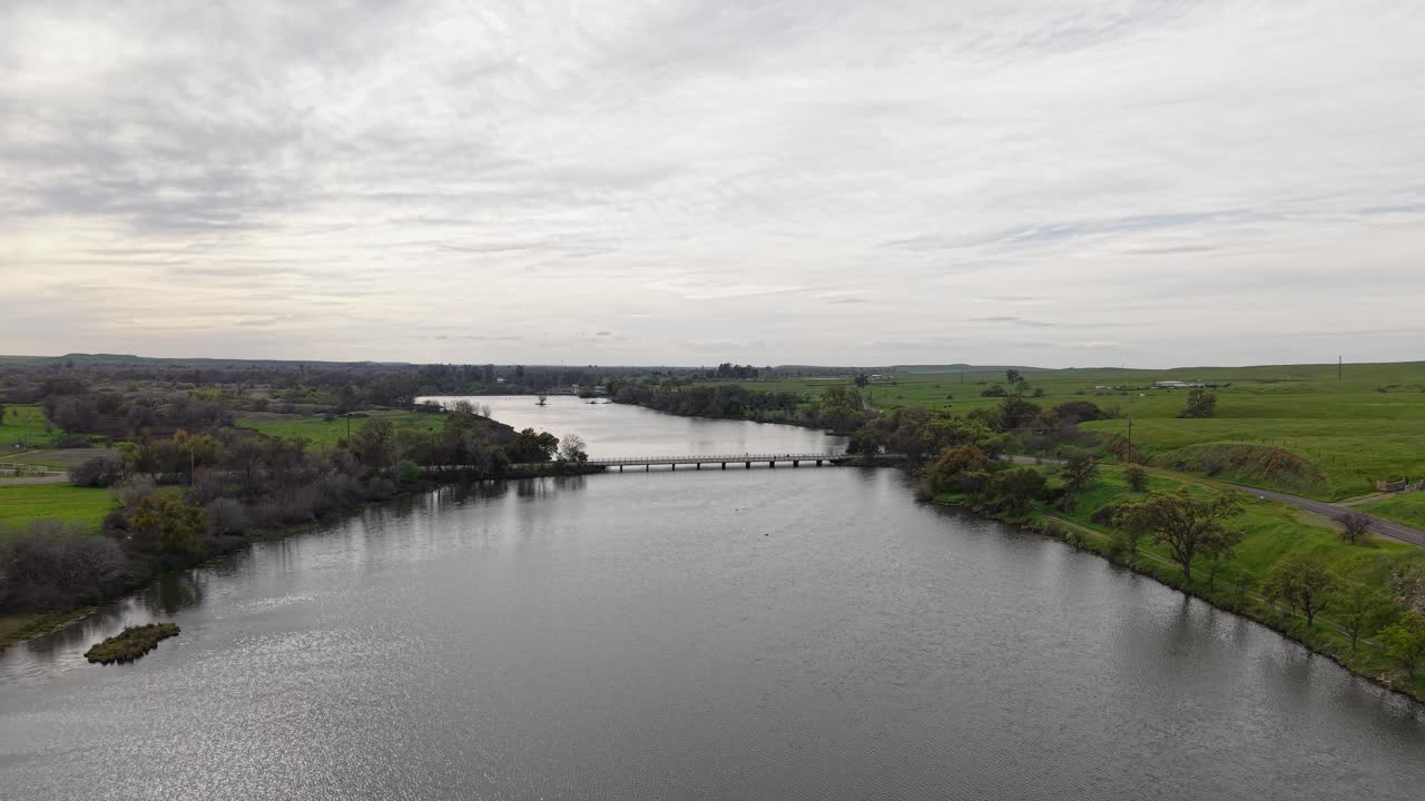 Capturing the Merced Bridge from above, this aerial footage showcases its engineering and surrounding nature. Shot on a DJI Air 3S.
