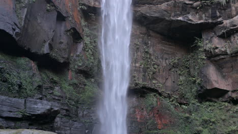 beautiful-slow-motion-overhang-of-Belmore-Falls-flowing-down-mountain