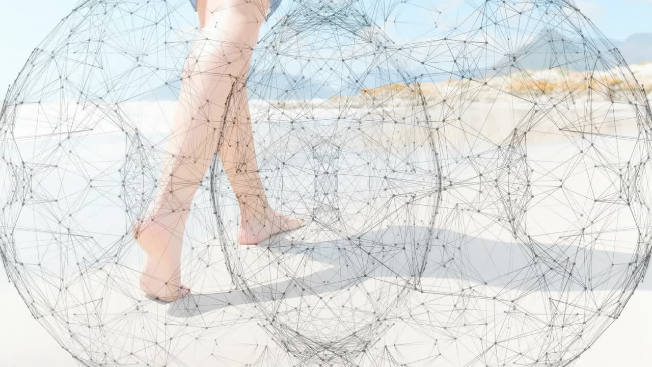 Barefoot person walking on beach with geometric network animation overlay