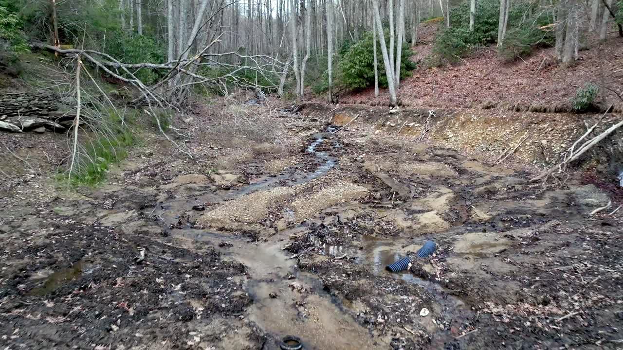 earthen dam break during hurricane helene near boone nc, north carolina