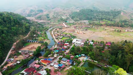 sapan village in mueang nan district, thailand aerial view of rice field and scenic mountains landscape