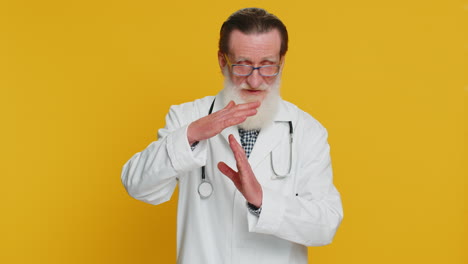 senior doctor shows time out gesture