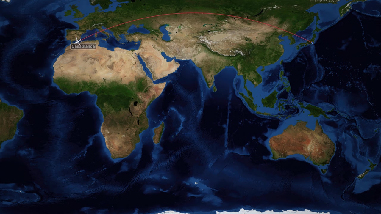 A digital world map tracks a plane flying from Tokyo to Casablanca with red lines