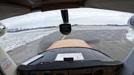 POV-inside-light-airplane-cockpit-taking-off-from-landing-strip,-propeller-spinning