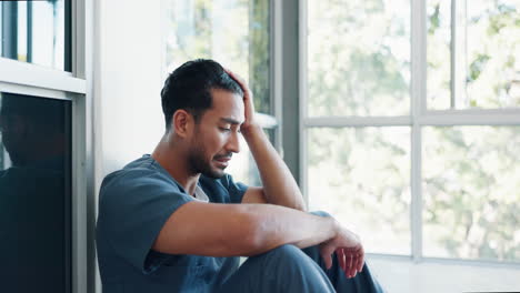 Nurse,-stress-or-depression-man-on-hospital-floor