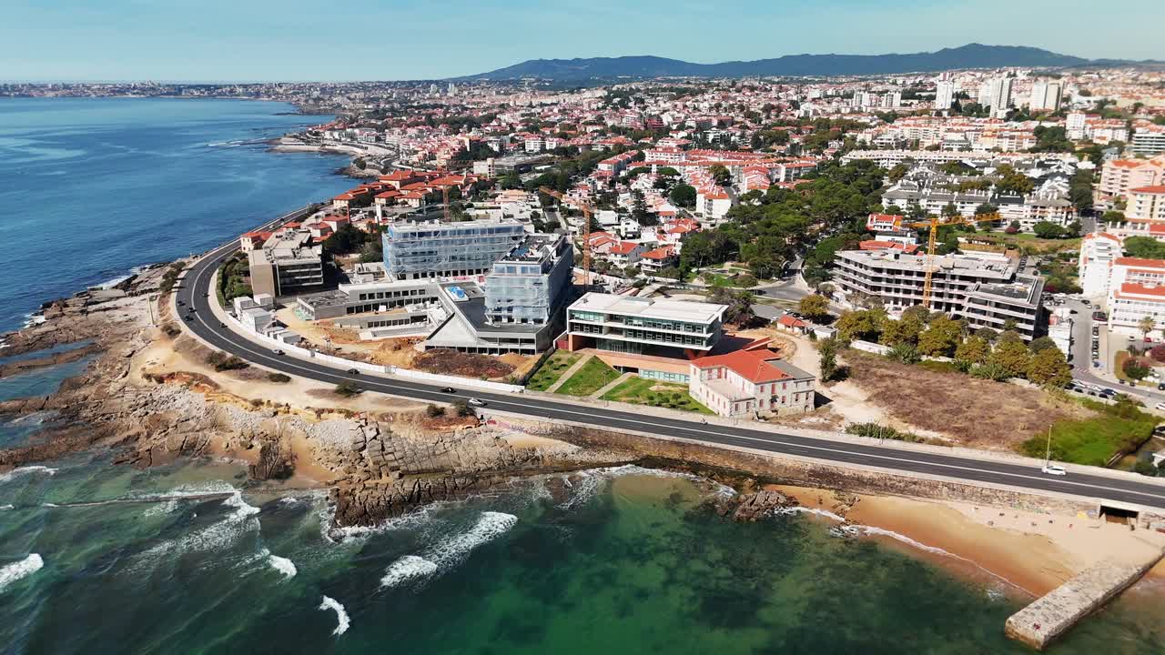 Aerial view of a coastal city with modern architecture
