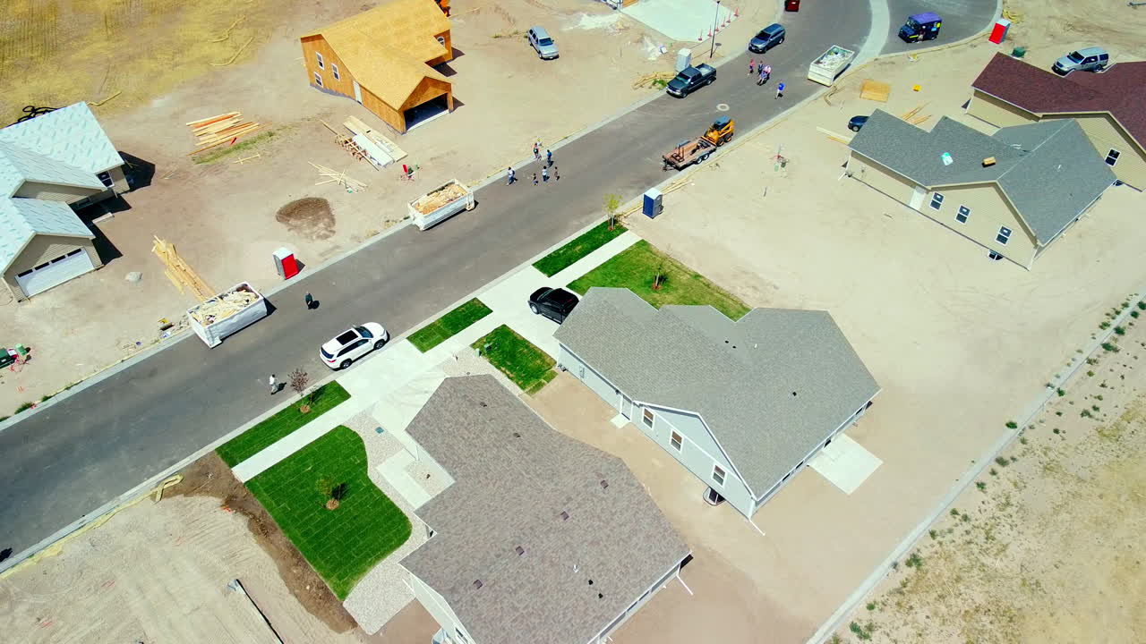 Tilt down to New Houses in middle of New Subdivision Construction