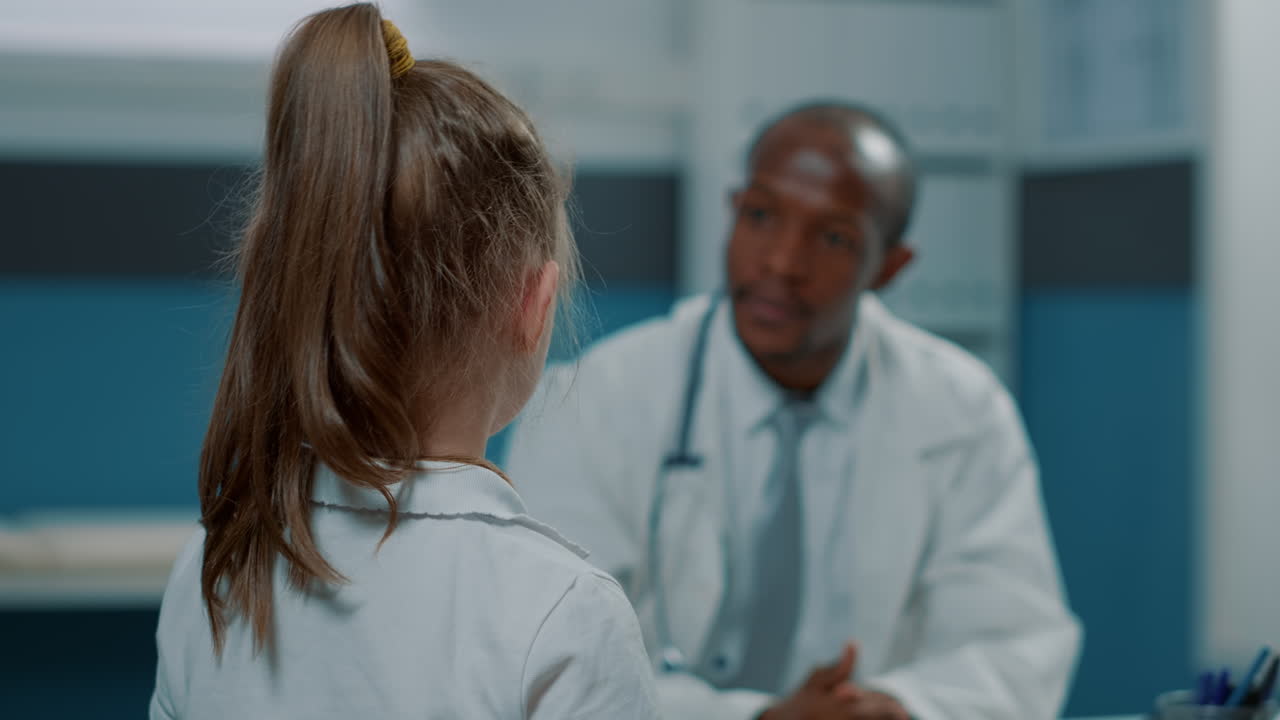 Child having a medical consultation with a doctor