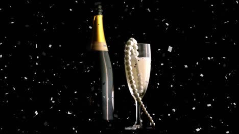 Animation-of-confetti-falling-and-pearl-necklace-in-champagne-glass