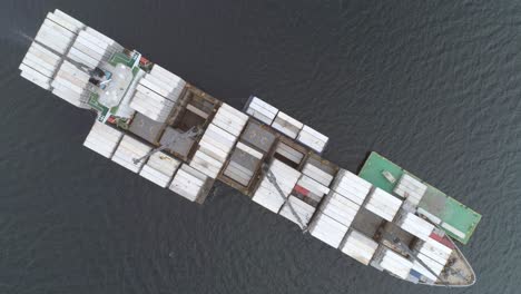 overhead shot of cargo ship with containers