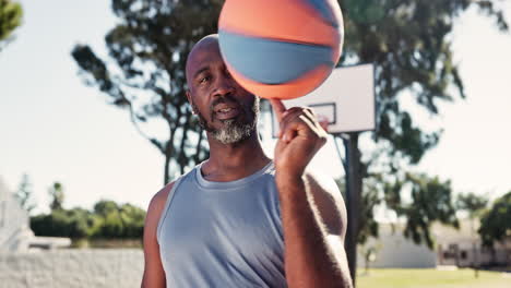 man spinning a basketball