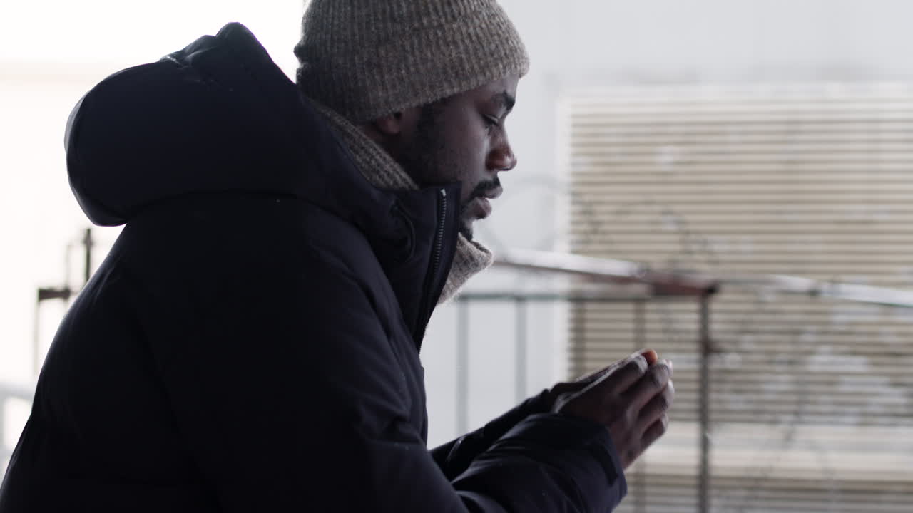 Black guy thinking outdoors