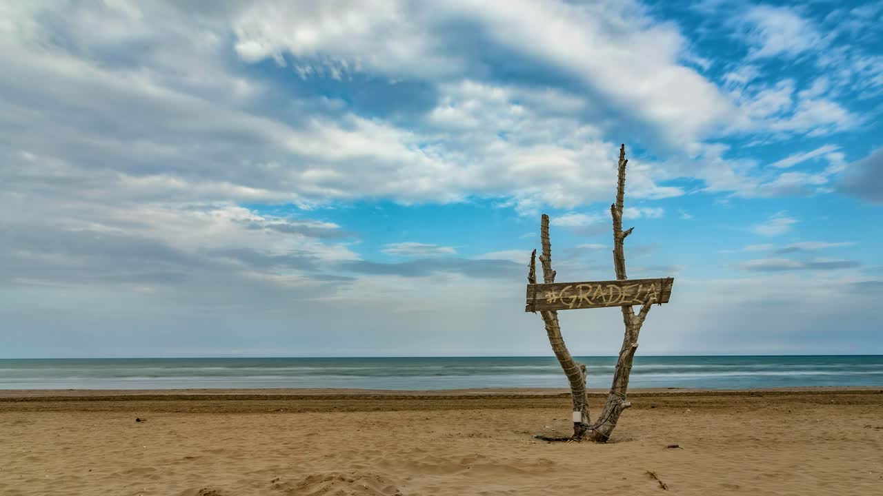 Serene Beach Landscape with Wooden Sign