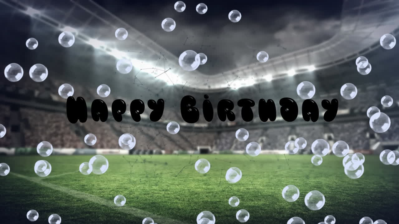 스포츠 경기장 위에 생일 축하 텍스트와 거품의 애니메이션