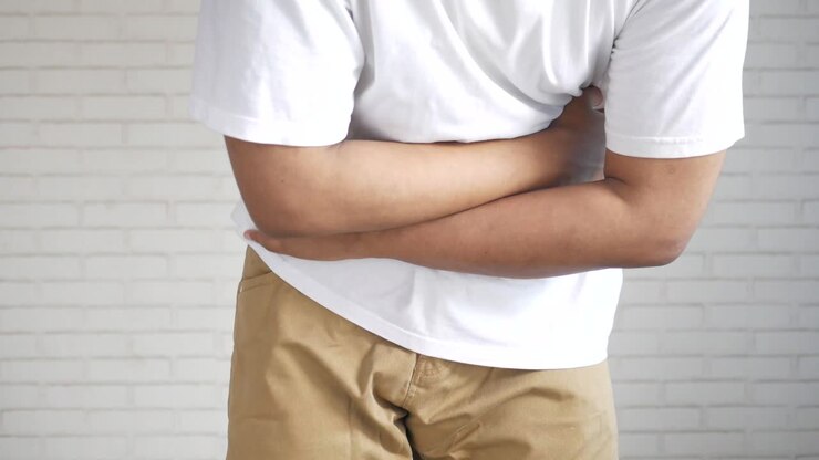 Man experiencing abdominal pain