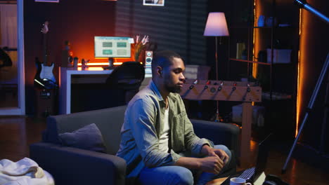 vertical video african american person receiving some bad news while doing remote work tasks