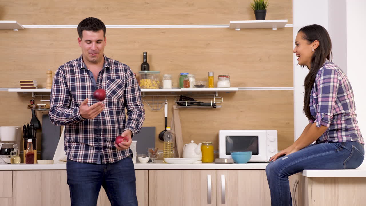 Couple spending time together in the kitchen