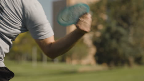 closeup disc golf tee shot on discgolf course