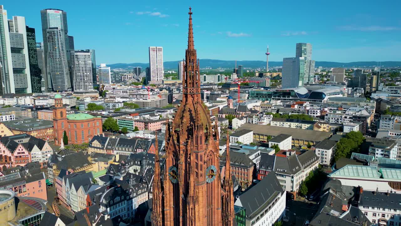 4K Aerial Drone Video of Modern Skyscrapers Overlooking the Historic Kaiserdom St. Bartholomäus Church in Downtown Frankfurt, Germany