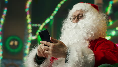 santa claus using a smartphone