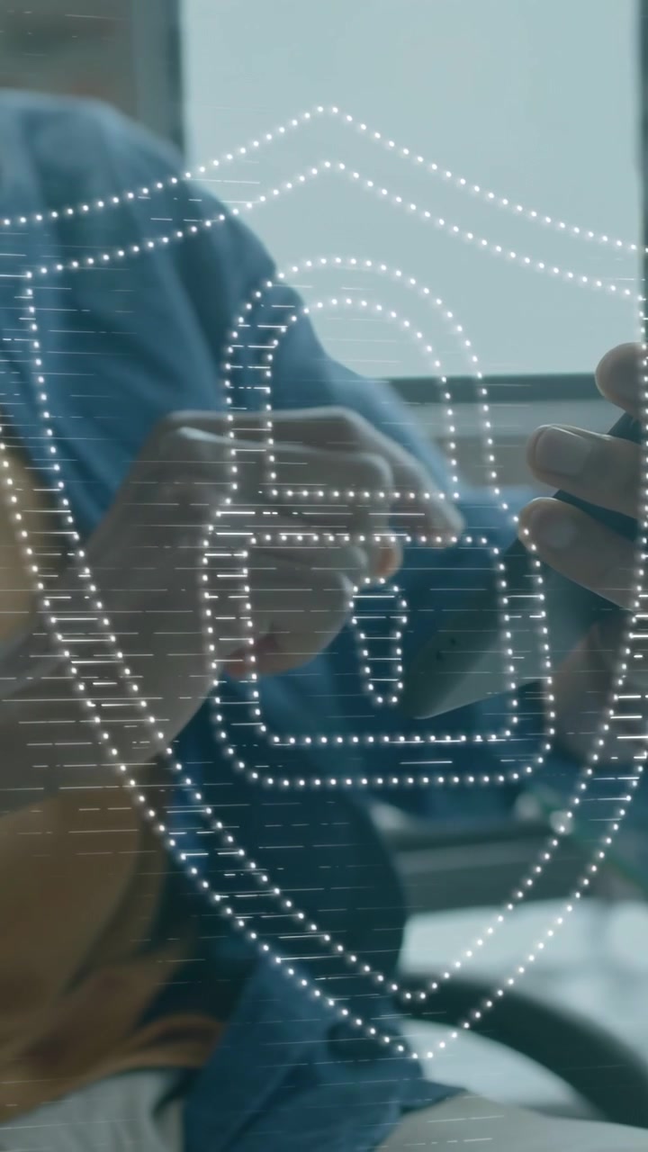 Vertical video: Man tapping and swiping phone, causing dotted shield lock overlay securing account