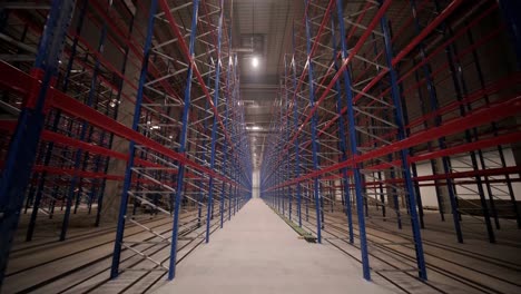 big and modern warehouse under construction, featuring metal shelving and other industrial equipment.