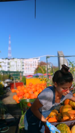 woman at a pumpkin patch market