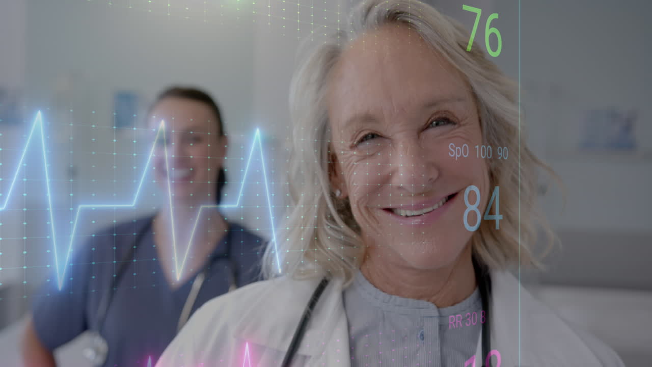 animación de monitor de ritmo cardíaco contra diversas mujeres médico y trabajador de la salud smiing en el hospital