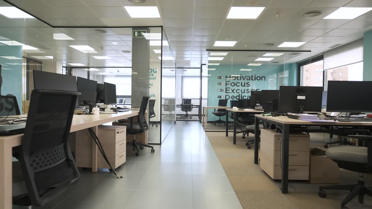 Spacious office interior with computers on tables