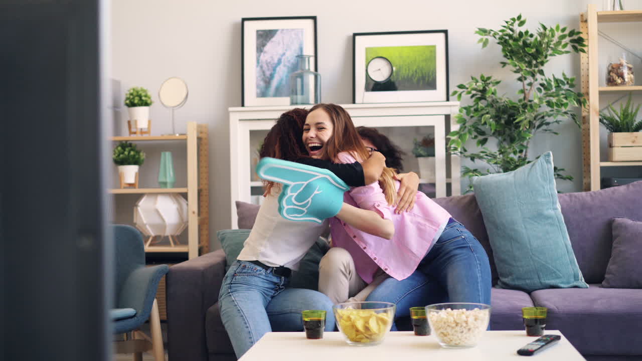 Friends Celebrating a Sporting Event at Home