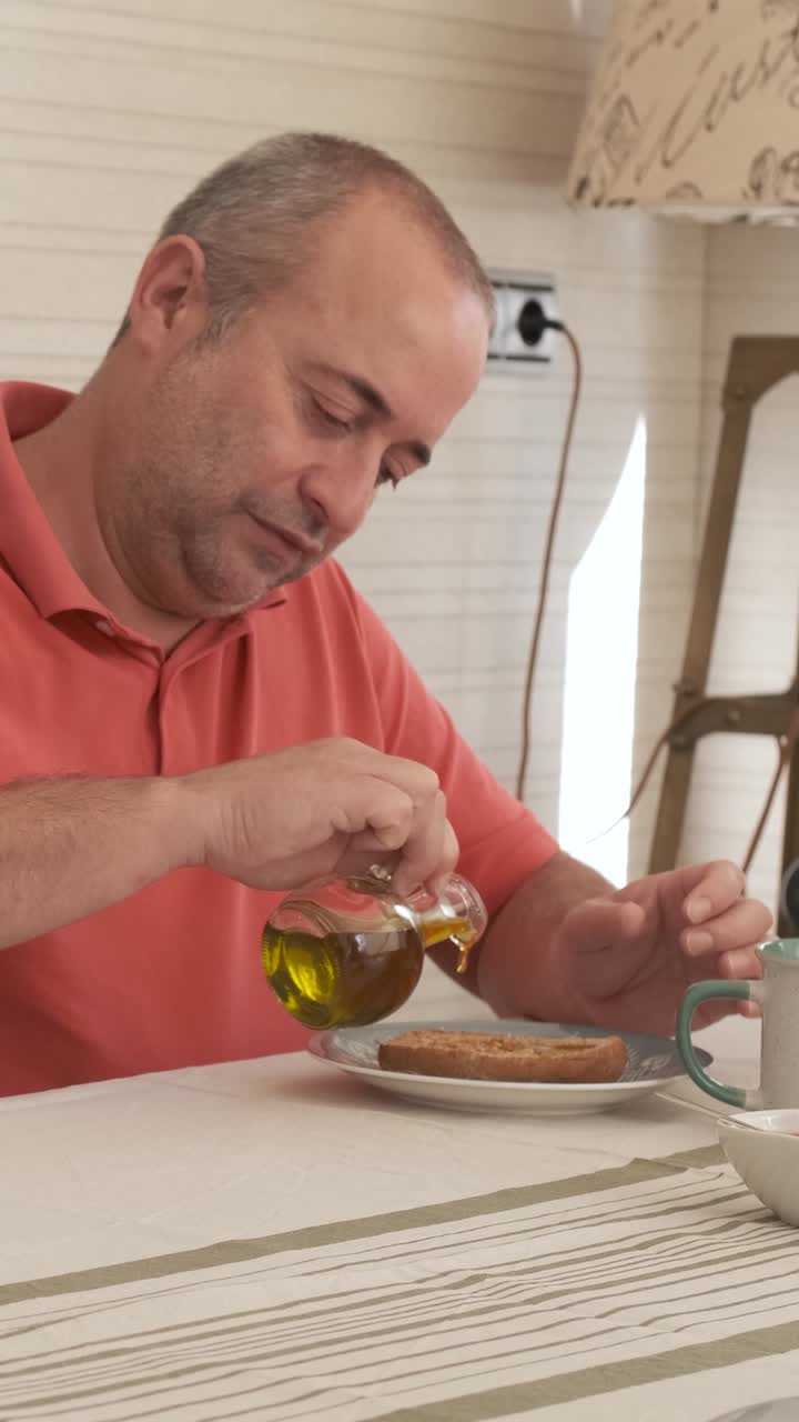 Happy grandfather having breakfast together at home