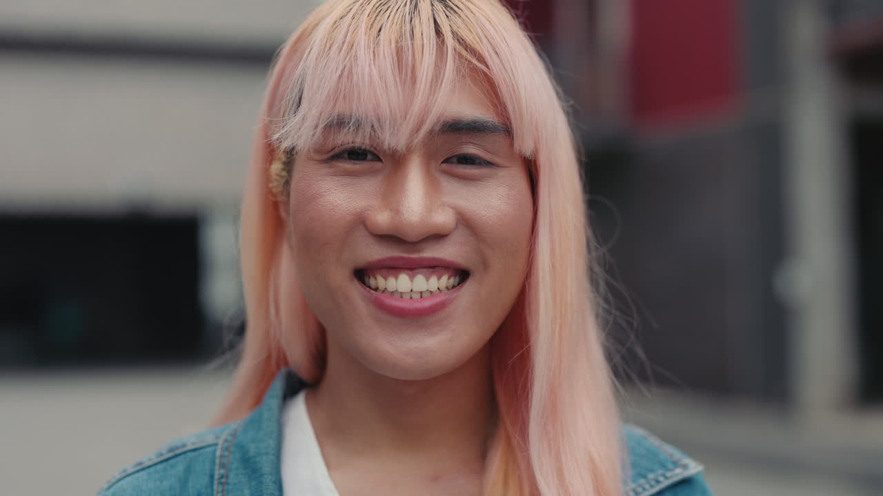 Smiling Person with Pink Hair
