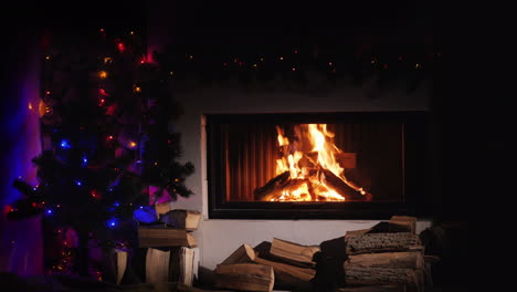 burning fireplace decorated for christmas near the new year tree