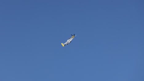 multiple helicopters executing flight patterns in clear skies