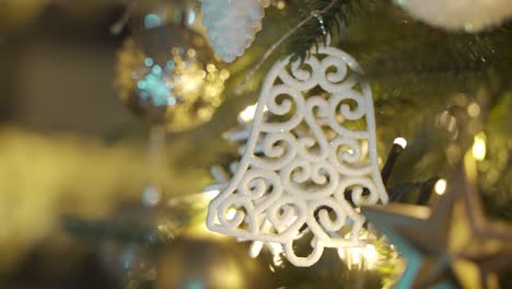 close-up view of a christmas tree with christmas decorations hanging