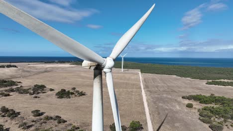 wind turbine, captured by orbiting drone shot in south australia