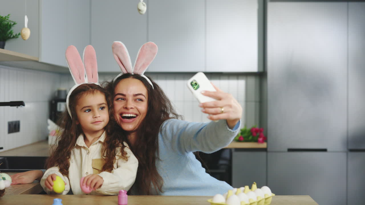 Mother and Daughter Taking a Selfie at Easter