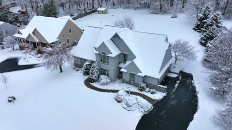 neighborhood homes in usa during winter snow storm