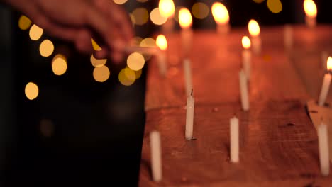 indian man lighting candles