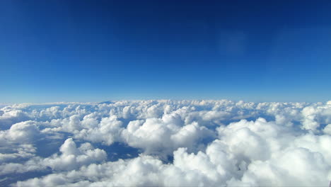 4k footage of a cloud filled sky, taken from an airplane