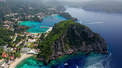 Aerial-drone-shot-over-the-picturesque-rocky-coastline-of-Paleokastritsa-bay-in-Corfu,-Greece