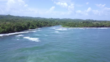 aerial shot of sea to land on sunny day