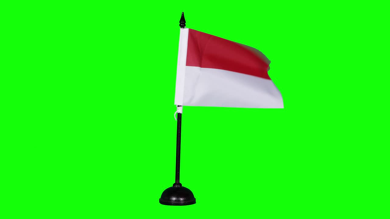 Indonesia miniature flag fluttering on a flagpole