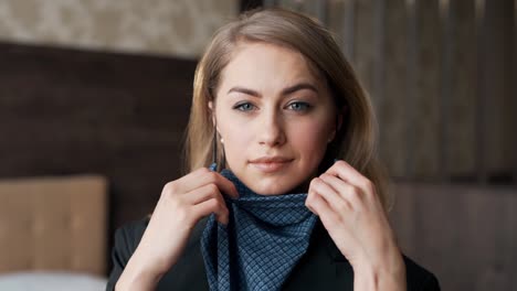 close-up portrait of a pretty adult girl wearing a protective headscarf mask