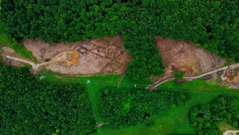 aerial 4k drone footage of environmental reality: rapid deforestation by human hands