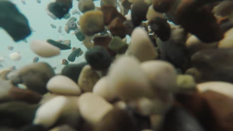 The-Sea-Surf-Fires-Pebbles-In-Different-Directions-The-Video-Was-Shot-Under-The-Water