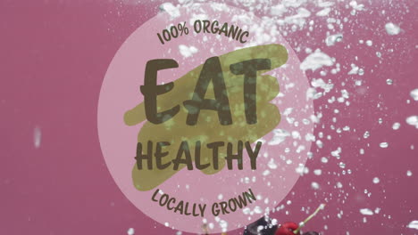animation of eat healthy text on circle on fruit falling into water background